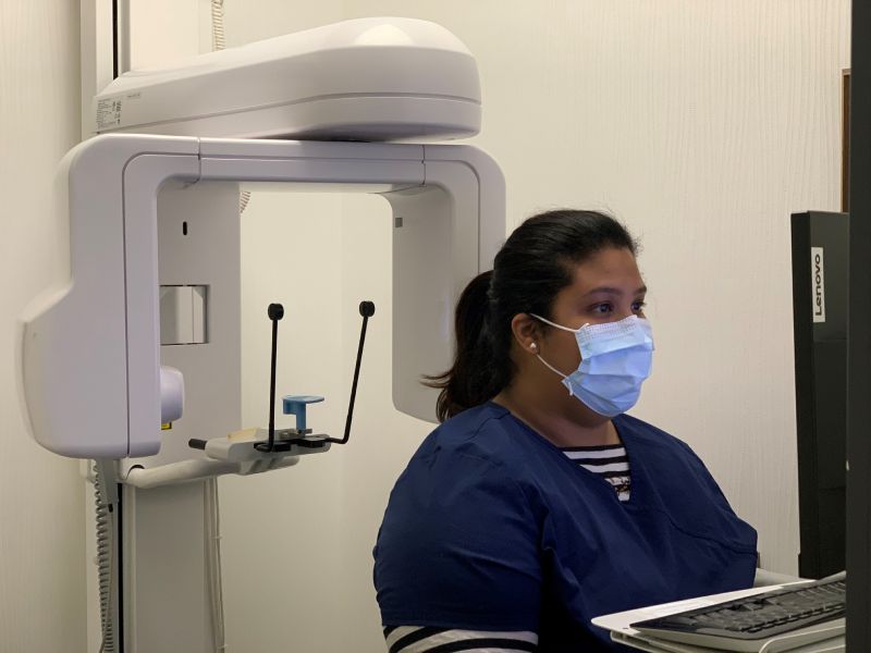 man smiling in dentists chair