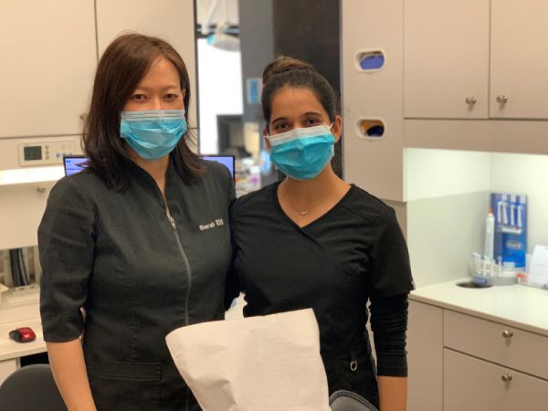 man smiling in dentists chair